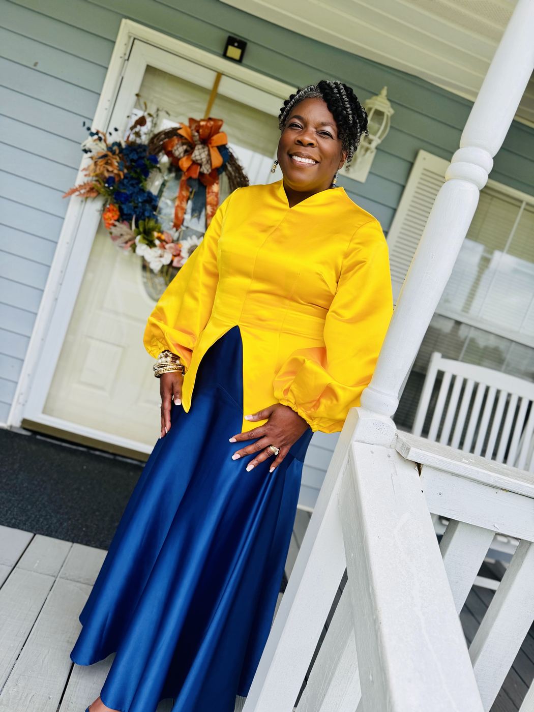 Cynthia Johnson smiling outside a District 148 home